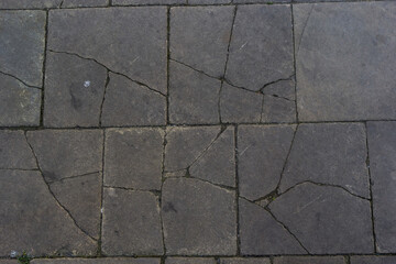 Obraz premium top view of concrete floor with colorful granite stone, cement floor of garden path way or patio decorated with various color and shape stone slabs, abstract texture background