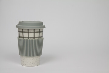 Reusable porcelain cup. Takeaway coffee and smart consumption