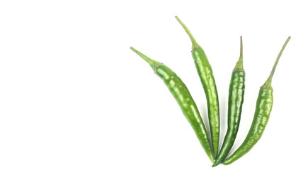Isolated green unripe chili on white background soft and selective focus