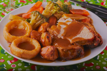 Christmas pork roast dinner with lashings of gravy.
