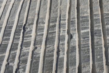 unprocessed marble background with extraction cuts