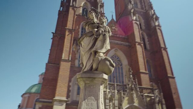View of the Cathedral of St. John the Baptist in Wroclaw on Ostrow Tumski. Old town, Poland, church, architecture, Roman Catholic, gothic, neo-gothic, gimbal. 4K Video Footage.