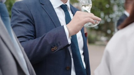 Businessmen in elegant office suit at corporate party, successful people having informal meeting at mansion terrace, colleagues relaxing at weekend, drinking exclusive alcohol beverages and talking