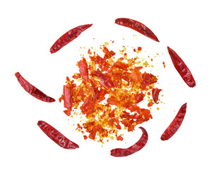 Crushed red hot pepper pile, Dried red hot chilli, Chili pepper flakes and seeds pile on white...