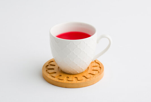 Cup Of Hot Aromatic Healthy Herbal Rooibos Or Hibiscus Red Tea. A Teacup Top View Isolated On White Background