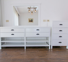 bespoke handmader bed room chest of draws and dresser in white wood finish
