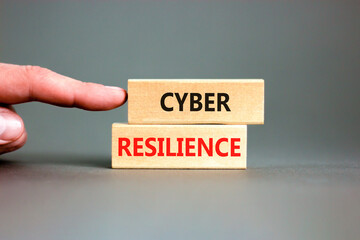 Cyber resilience symbol. Concept word Cyber resilience typed on wooden blocks. Beautiful grey table...