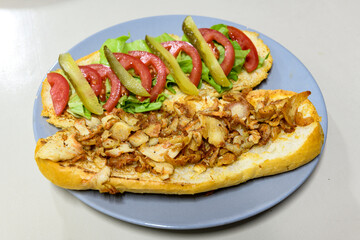Turkish and Arabic Traditional Ramadan doner kebab with tasty tomato sauce and rice or turkish...