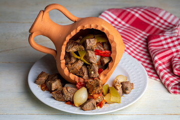 Authentic Turkish Testi Kebab cooked in earthenware waterjug, Turkish name; Testi kebabi