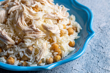 Traditional delicious Turkish food; Rice with chickpeas and chicken (Turkish name; Tavuklu nohutlu pilav or pilaf)