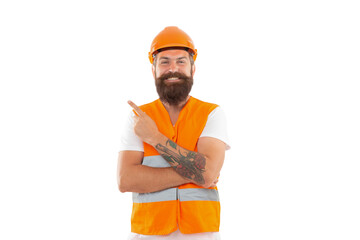 cheerful contractor pointing finger isolated on white background. contractor man in uniform.