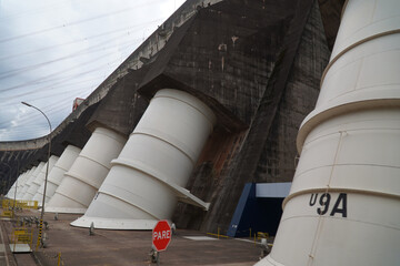 Huge water pipes in front of the turbine shafts at the Itaipu hydropower plant, the largest...