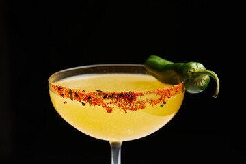 cocktail with vodka, green chili pod in martini glass - obrazy, fototapety, plakaty