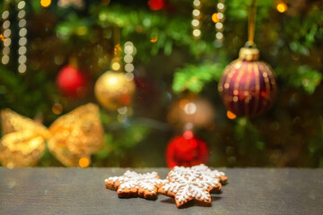 homemade gingerbread cookies on Christmas tree background