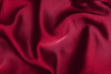 Year 2023 color Viva magenta. fabric laid in soft folds