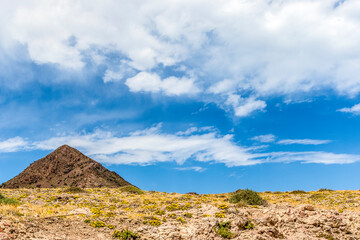 Landscape of Cabo de Gata national park with a pyramid mountain, Andalucia, Spain, Europe