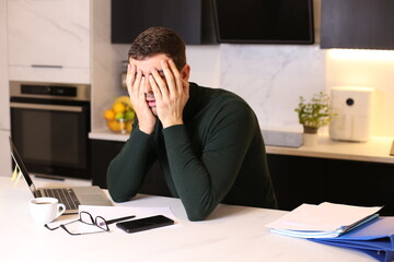 Fototapeta premium Overworked man in home office 