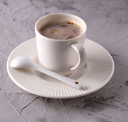 photo cup with coffee on a saucer