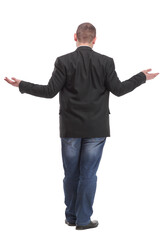 back view of walking business man. Isolated over white background.