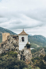 Fototapeta na wymiar Bell tower of Guadalest built on a rock in height