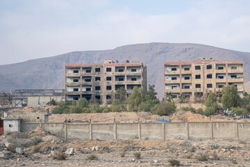 On the road from Aleppo to Damascus, destroyed building, Syria