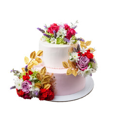 Two-tiered wedding cake on a white background. Decorated with flowers, roses, asters .