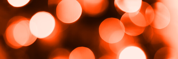 Blurred lights, dark orange background, banner texture. Abstract bokeh with soft light header. Wide...