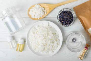 Set for homemade natural white eco-friendly soy wax candles in glass, wick, aroma oil and dried...