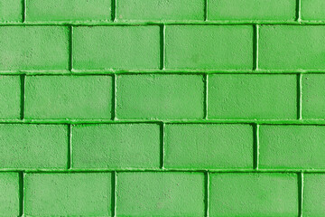 Green verdant paint wall brick blocks exterior facade texture background home abstract house