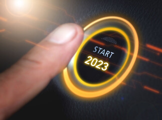 2023,Finger pressing a 2023 start button. Concept of new year, two thousand twenty three. Composite between a photography and a 3D background.