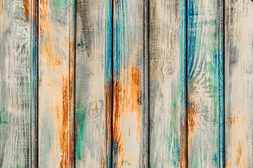 Wooden texture painted with multicolored patterns, decorative, designer colorful interior boards surface color fence plank background