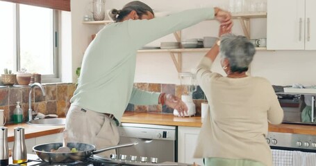 Love, cooking and senior couple dance, happiness and bonding with romance in kitchen. Romantic, mature woman and old man dancing, loving or food for lunch, retirement or enjoy quality time together