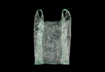 Plastic bag isolated on black background.
