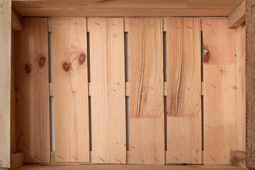 Opened wooden box. Wooden background