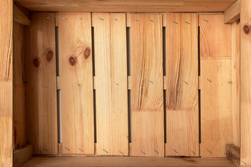 Opened wooden box. Wooden background