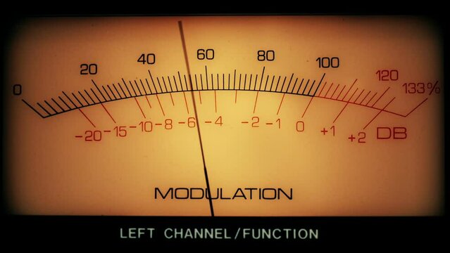 Vintage analog signal modulation meter from an AM signal transmitter.
