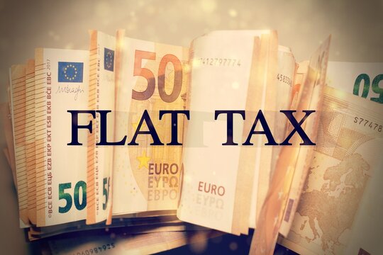 Euros banknotes with the text "Flat Tax"