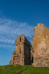 Fototapeta na wymiar Ruins of Toolse Order Castle on a sunny summer evening. One of the more recent medieval castles on the northern coast of Estonia. 