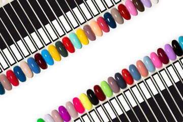 Nail polish samples of different bright colors on a white background. Colorful manicure samples...