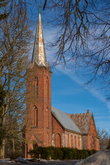 Fototapeta na wymiar St. Andrew’s Lutheran Church in Äksi, Tartu County on a sunny spring day.