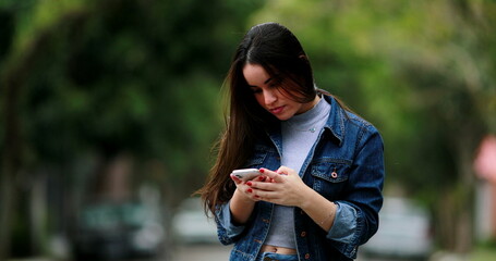 Happy woman receiving excellent news message on cellphone device feeling joy for opportunity