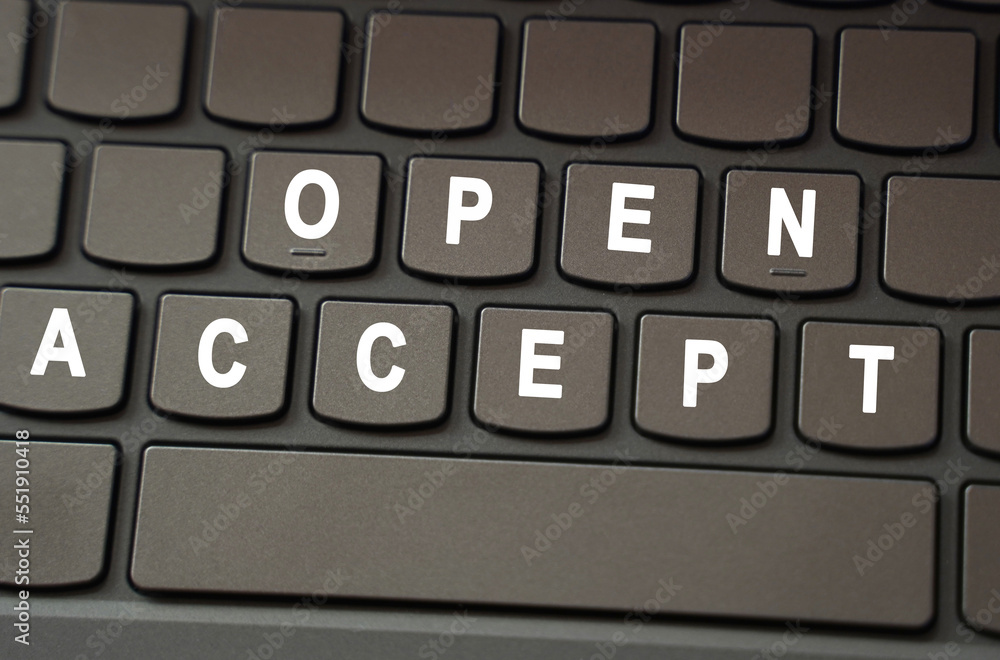 Poster on the black keyboard, the inscription is highlighted in white - open access