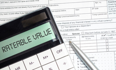 rateable value words on calculator display with tax forms
