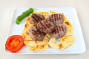 Meatball between bread (Turkish name : ekmek arasi kofte ) Izgara kofte
