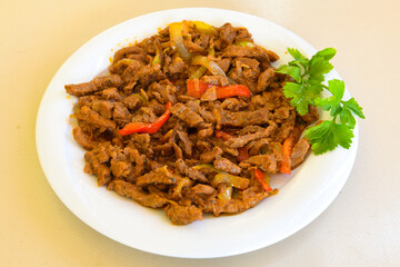 Sauteed chicken with carrots and peas ( Turkish ; Et, Tavuk Sote, guvec  )