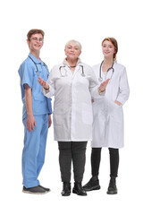 Portrait of a female doctor with two of her co-workers against white background