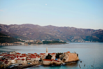 Evening view of the old town of Budva and mountains, Montenegro