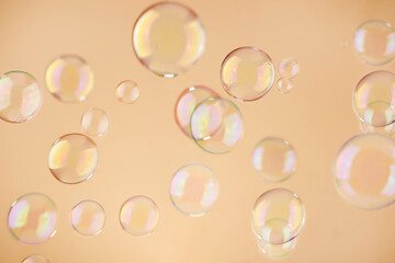 Abstract orange soap bubbles background. Orange soap bubbles wallpaper.