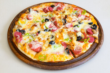Delicious mixed pizza with rich content. Menu concept of choice and diversity. Karisik pizza