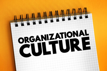 Organizational culture - collection of values, expectations, and practices that guide and inform the actions of all team members, text concept on notepad